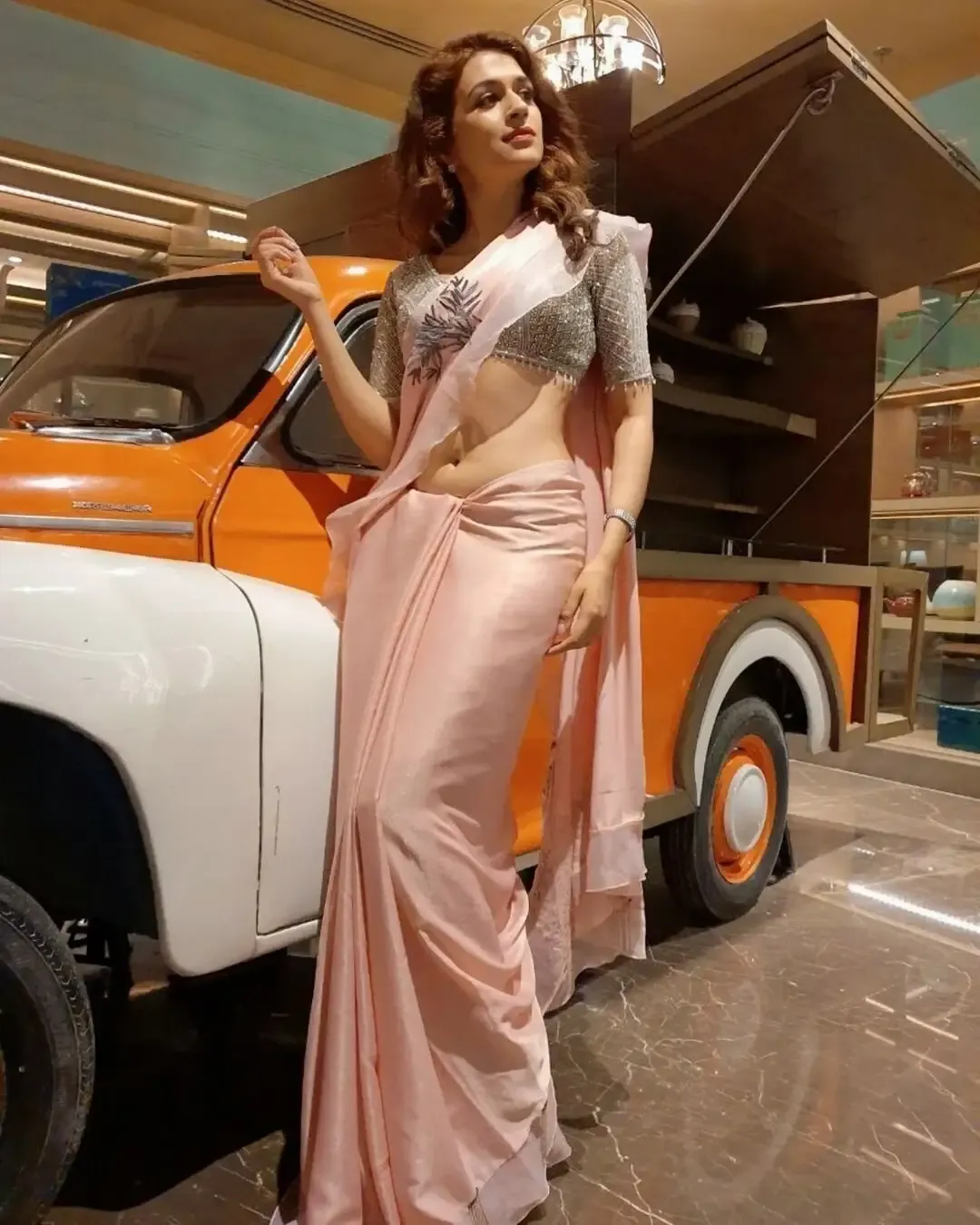 South Indian Model Shraddha Das Photoshoot in Pink Saree